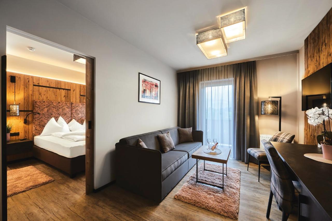Aparthotel Bergland Soll Bagian luar foto