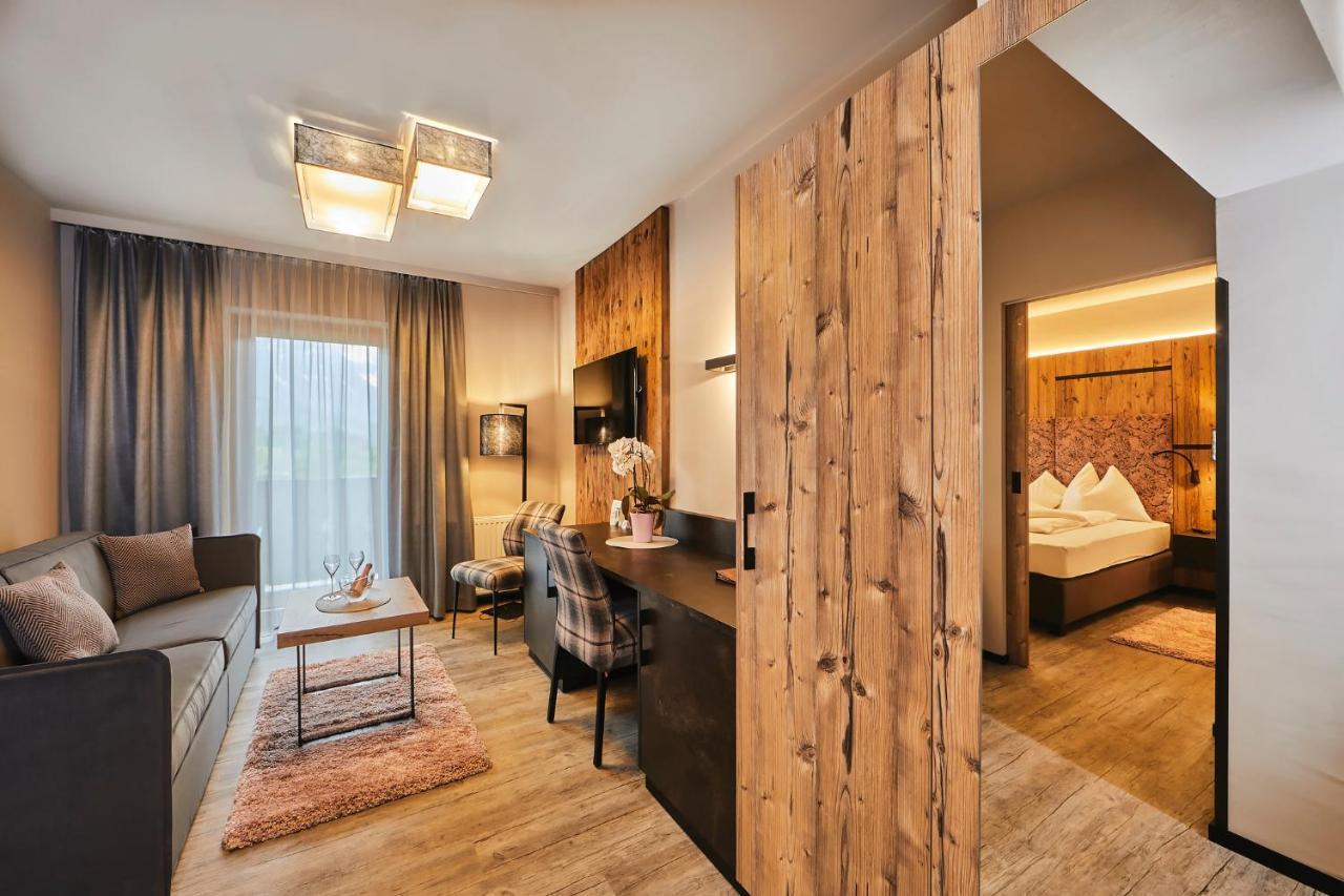 Aparthotel Bergland Soll Bagian luar foto