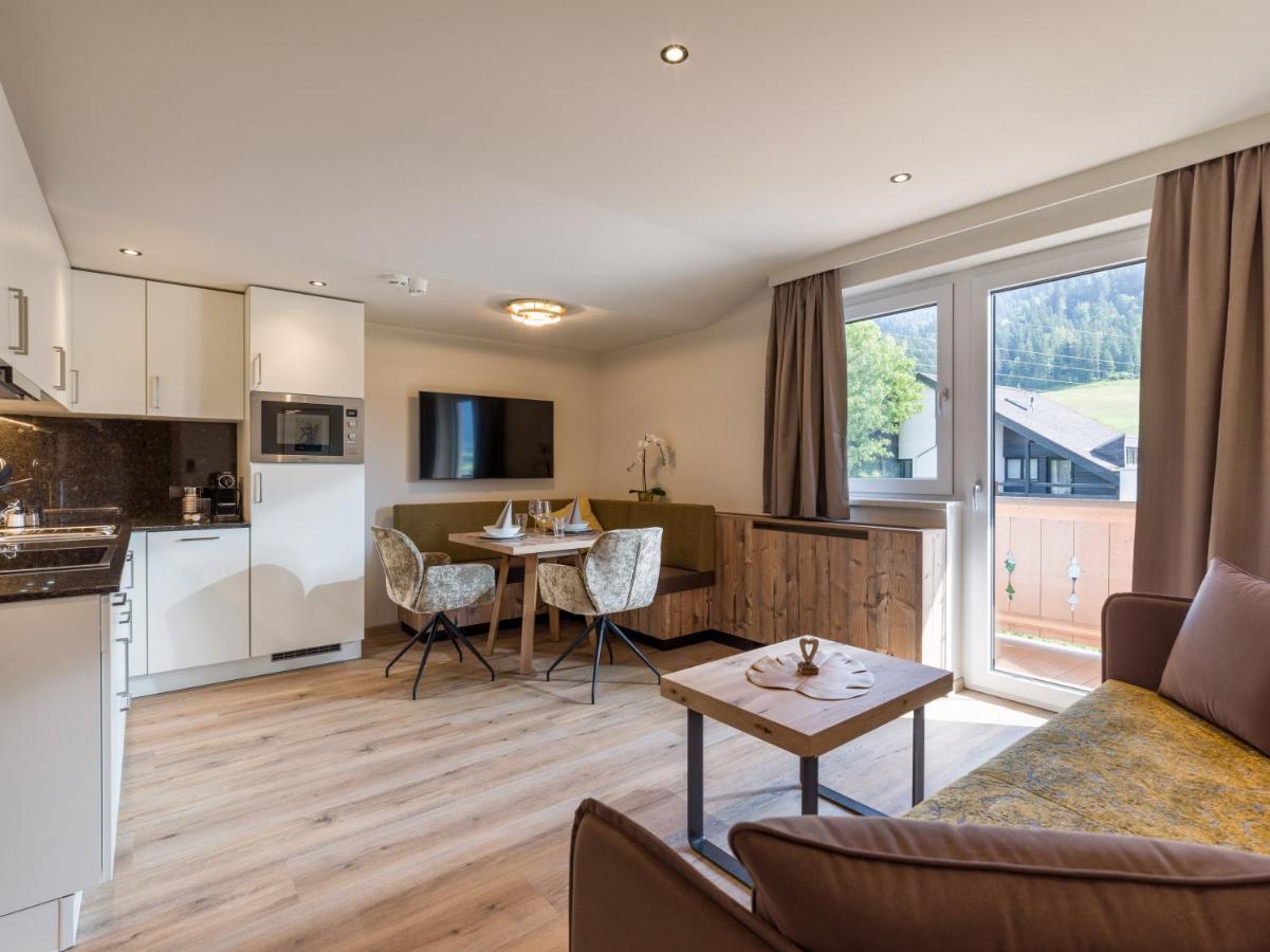 Aparthotel Bergland Soll Bagian luar foto