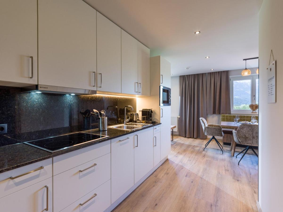 Aparthotel Bergland Soll Bagian luar foto
