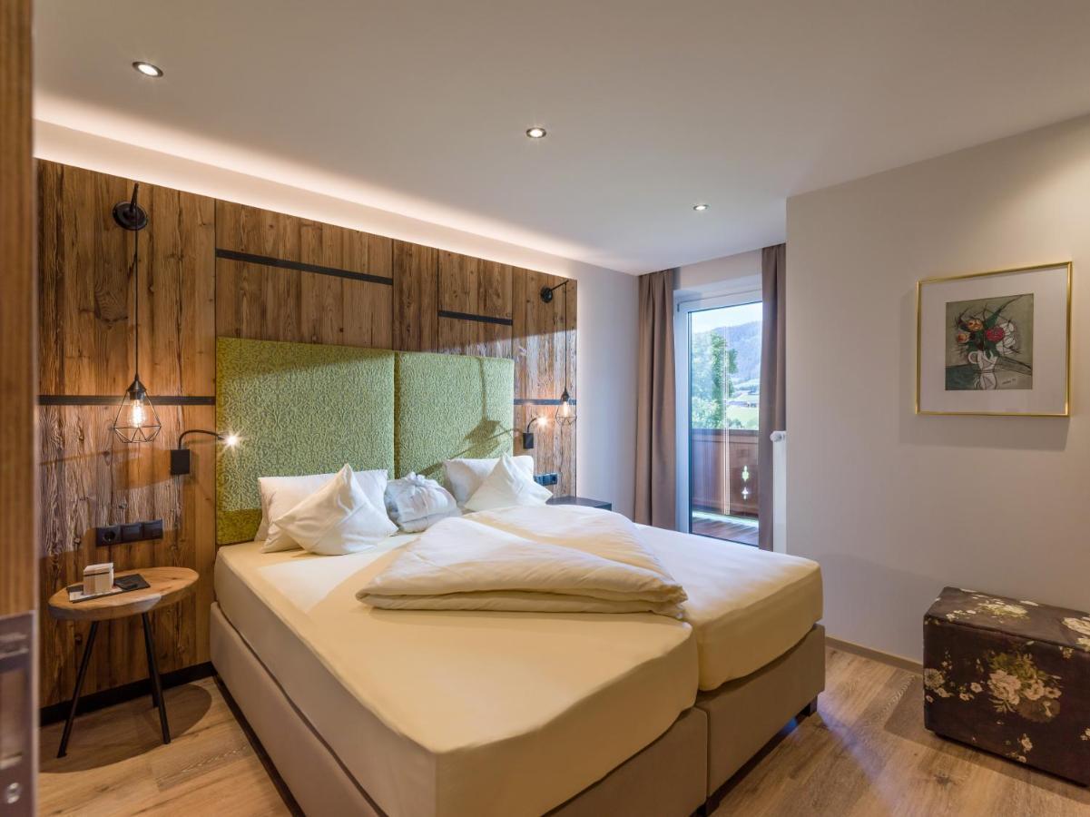 Aparthotel Bergland Soll Bagian luar foto