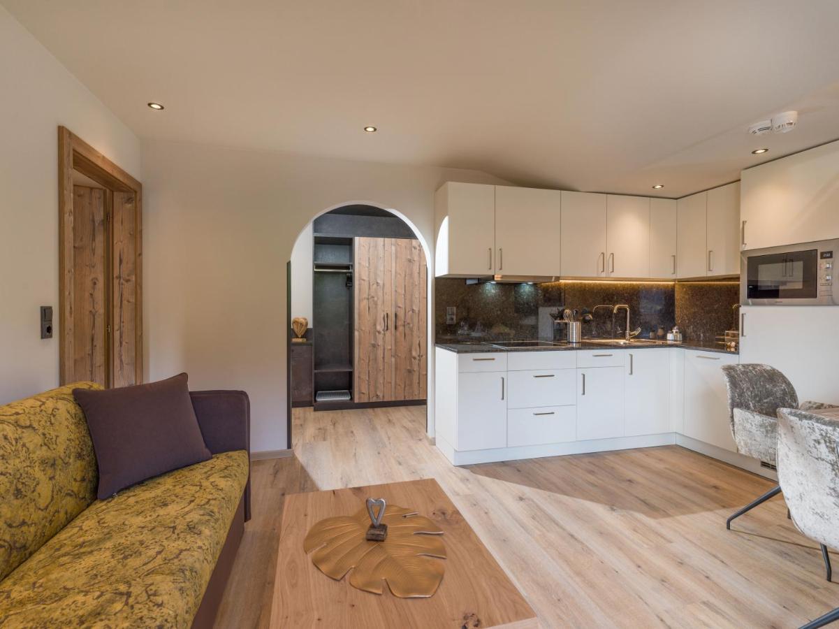 Aparthotel Bergland Soll Bagian luar foto