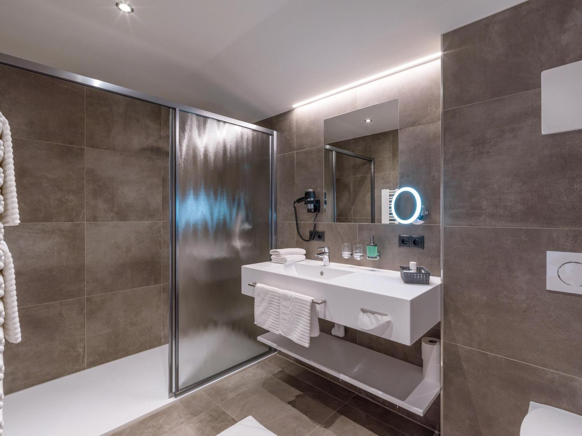 Aparthotel Bergland Soll Bagian luar foto