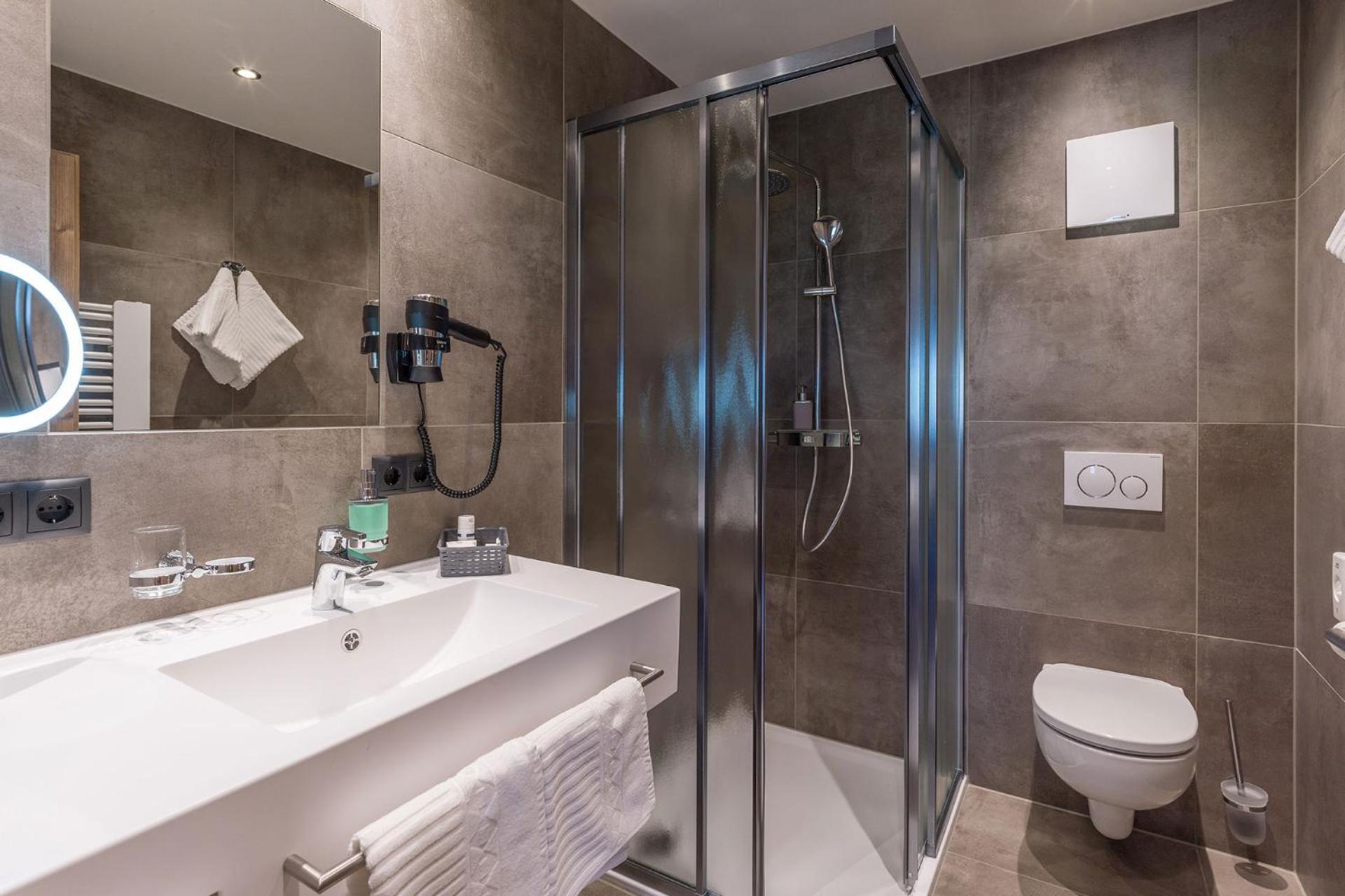 Aparthotel Bergland Soll Bagian luar foto
